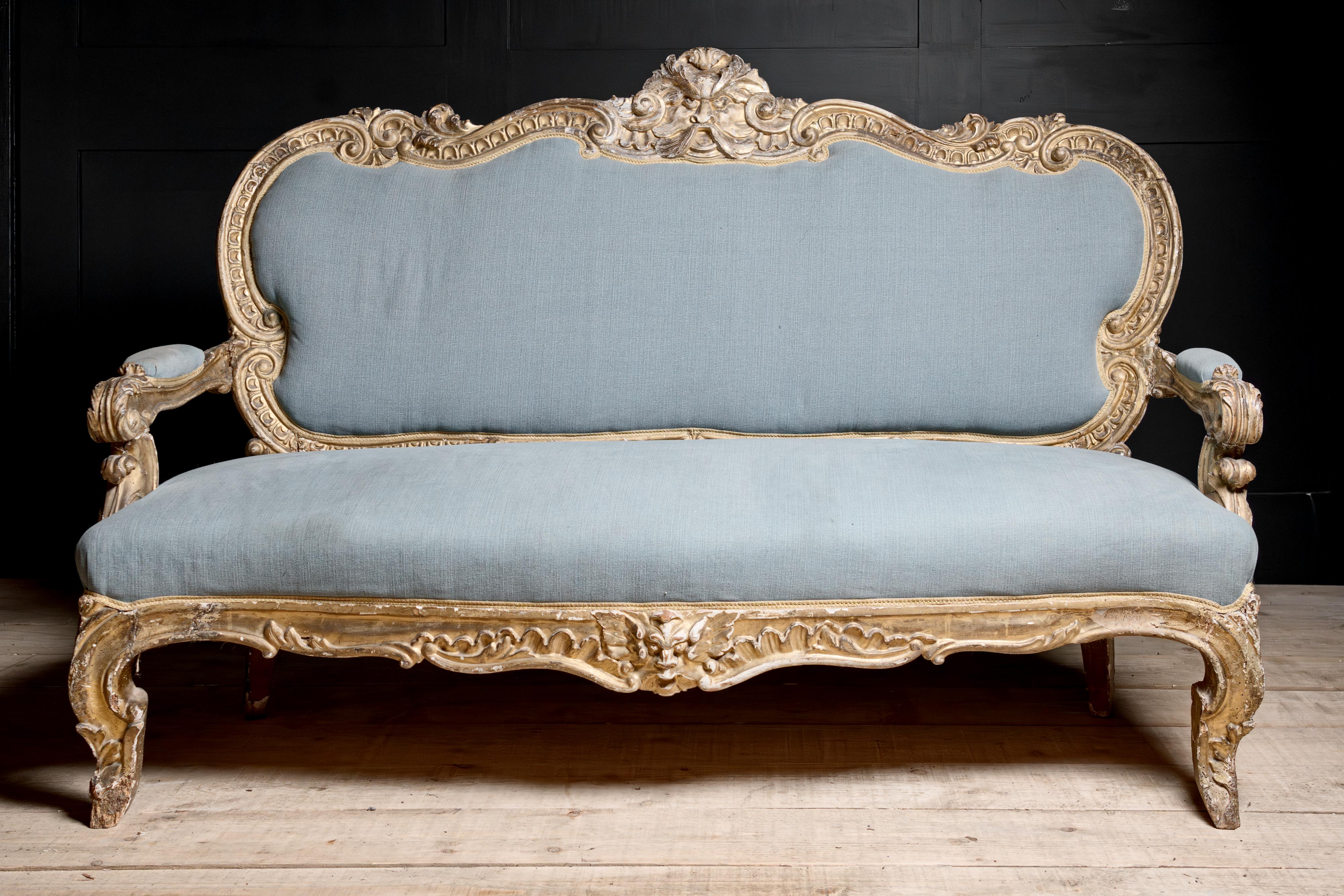 18th Century Baroque styled  Italian salon sofa gilt carved hardwood Aeolus, greek god of wind newly upholstered Kingham Hampshire Alton Vintage Antique For Sale UK
