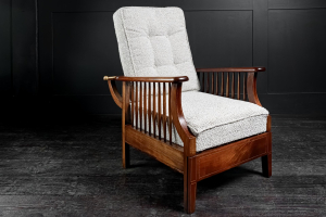 Extending English arts and crafts metamorphic salon smokers chair William Morris Liberty's of London lounger Oak and Mahogany marquetry contemporary Boucle upholstery Early 20th Century. Circa 1920