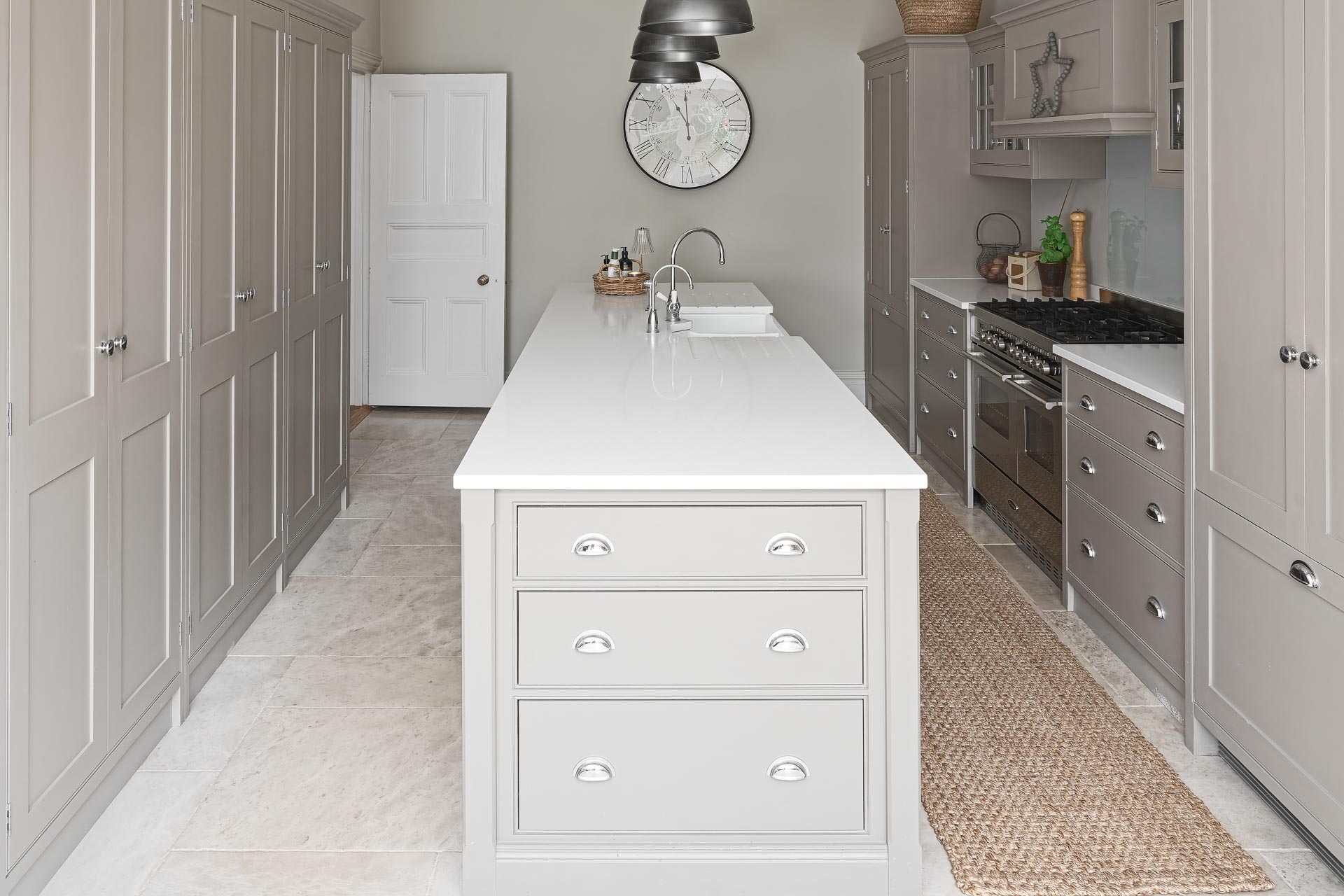 Kingham design truly bespoke kitchen shaker style luxury handmade boot mud utility linen laundry pantry larder fisher paykel miele neff  butler sink perrin rowe Guildford Surrey.