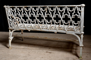 cast iron English garden bench Gothic. Painted white aged patina.Braced legs Mid century English