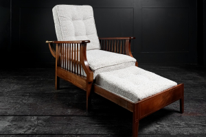 Extending English arts and crafts metamorphic salon smokers chair William Morris Liberty's of London lounger Oak and Mahogany marquetry contemporary Boucle upholstery Early 20th Century. Circa 1920