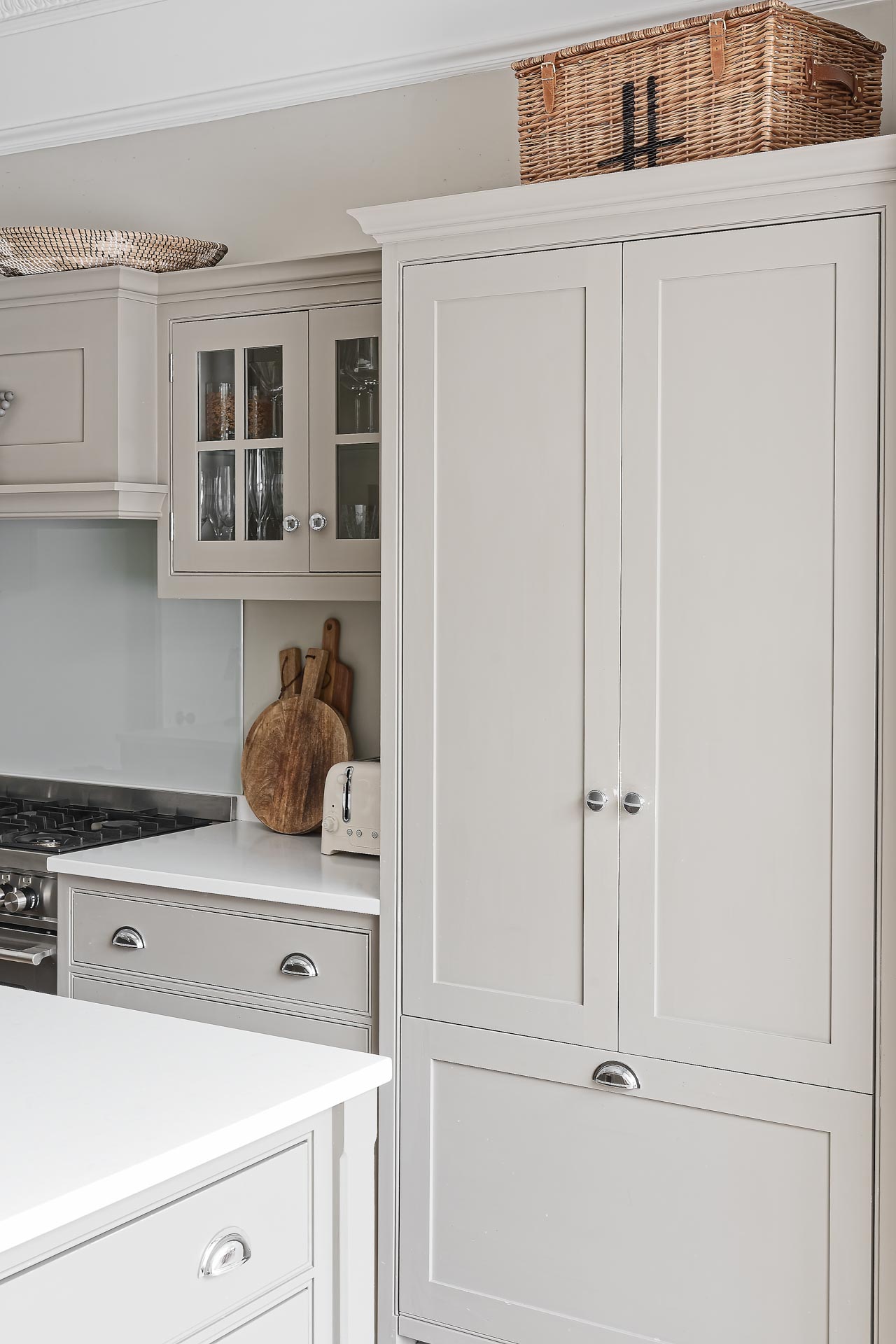 Kingham design truly bespoke kitchen shaker style luxury handmade boot mud utility linen laundry pantry larder fisher paykel miele neff butler sink perrin rowe Guildford Surrey.