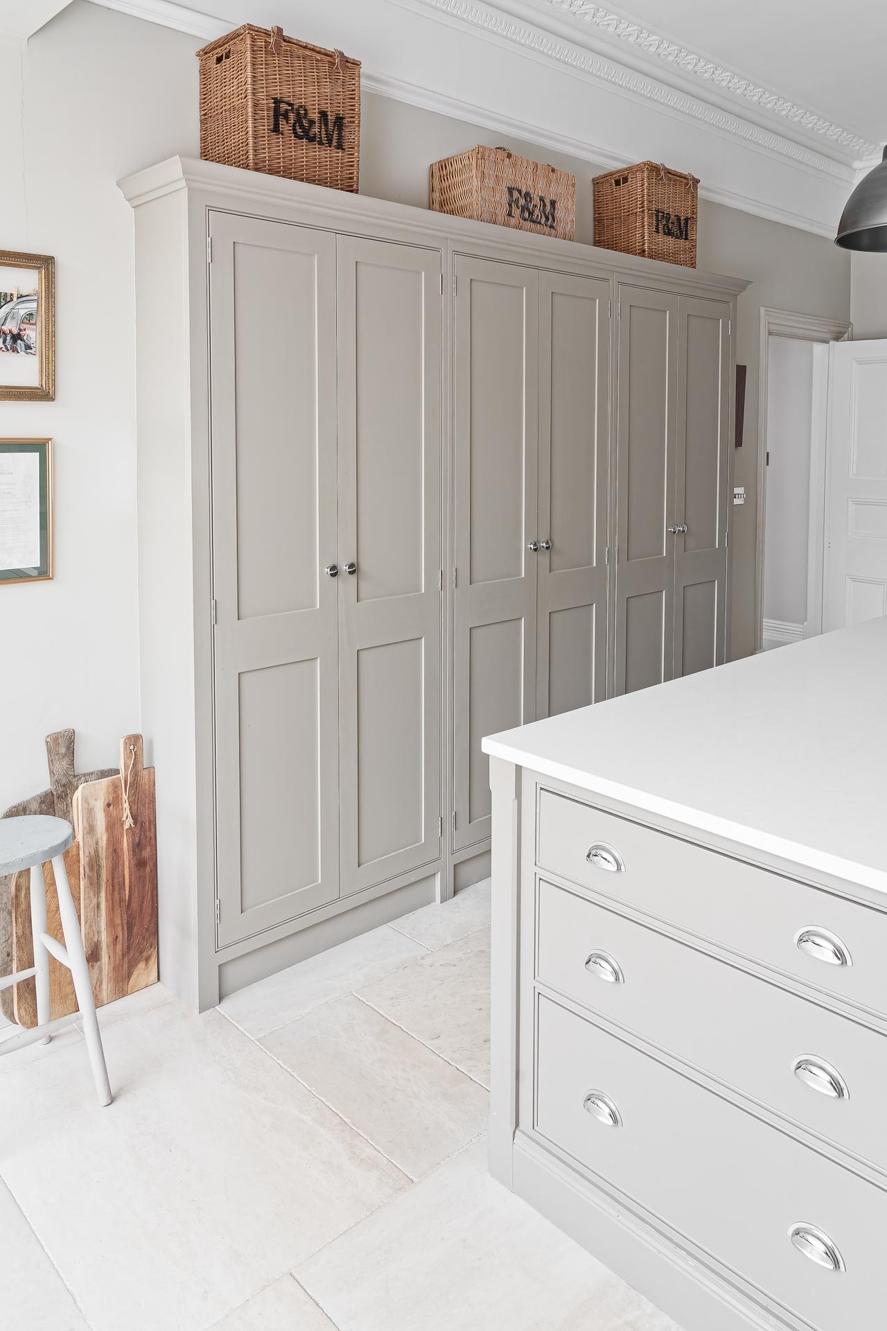 Kingham design truly bespoke kitchen shaker style luxury handmade boot mud utility linen laundry pantry larder fisher paykel miele neff butler sink perrin rowe Guildford Surrey.