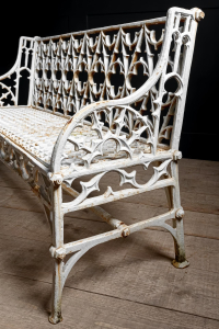 cast iron English garden bench Gothic. Painted white aged patina.Braced legs Mid century English