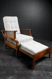 Extending English arts and crafts metamorphic salon smokers chair William Morris Liberty's of London lounger Oak and Mahogany marquetry contemporary Boucle upholstery Early 20th Century. Circa 1920