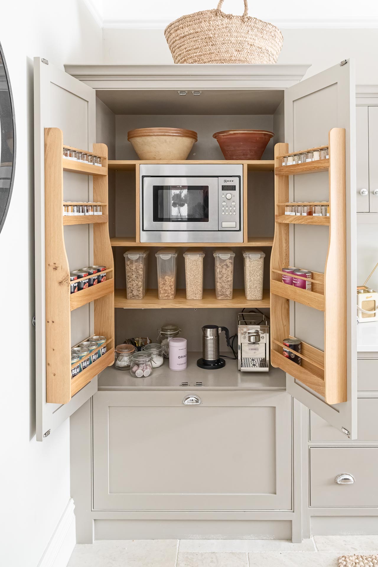 Kingham design truly bespoke kitchen shaker style luxury handmade boot mud utility linen laundry pantry larder fisher paykel miele neff butler sink perrin rowe Guildford Surrey.