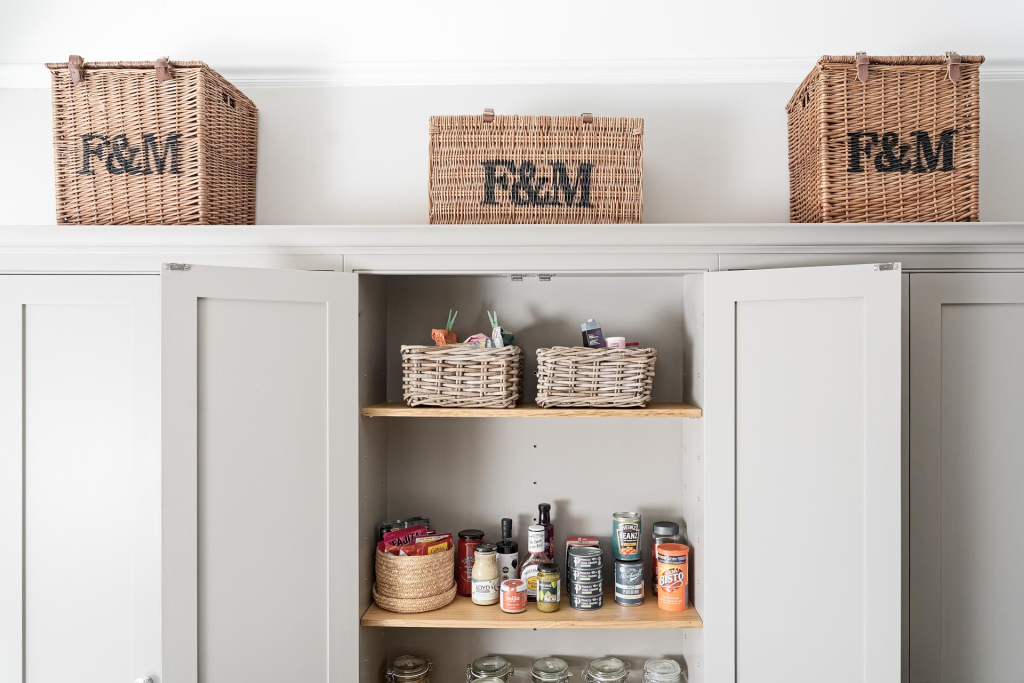 Kingham design truly bespoke kitchen shaker style luxury handmade boot mud utility linen laundry pantry larder fisher paykel miele neff  butler sink perrin rowe Guildford Surrey.