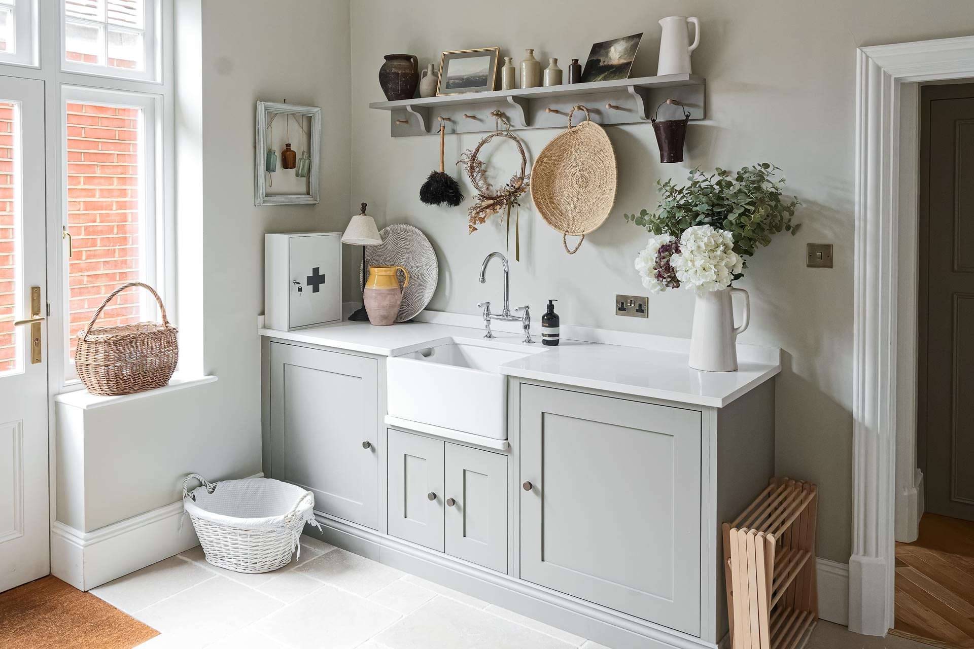 Kingham design truly bespoke kitchen shaker style luxury handmade boot mud utility linen laundry pantry larder fisher paykel miele neff  butler sink perrin rowe Guildford Surrey.