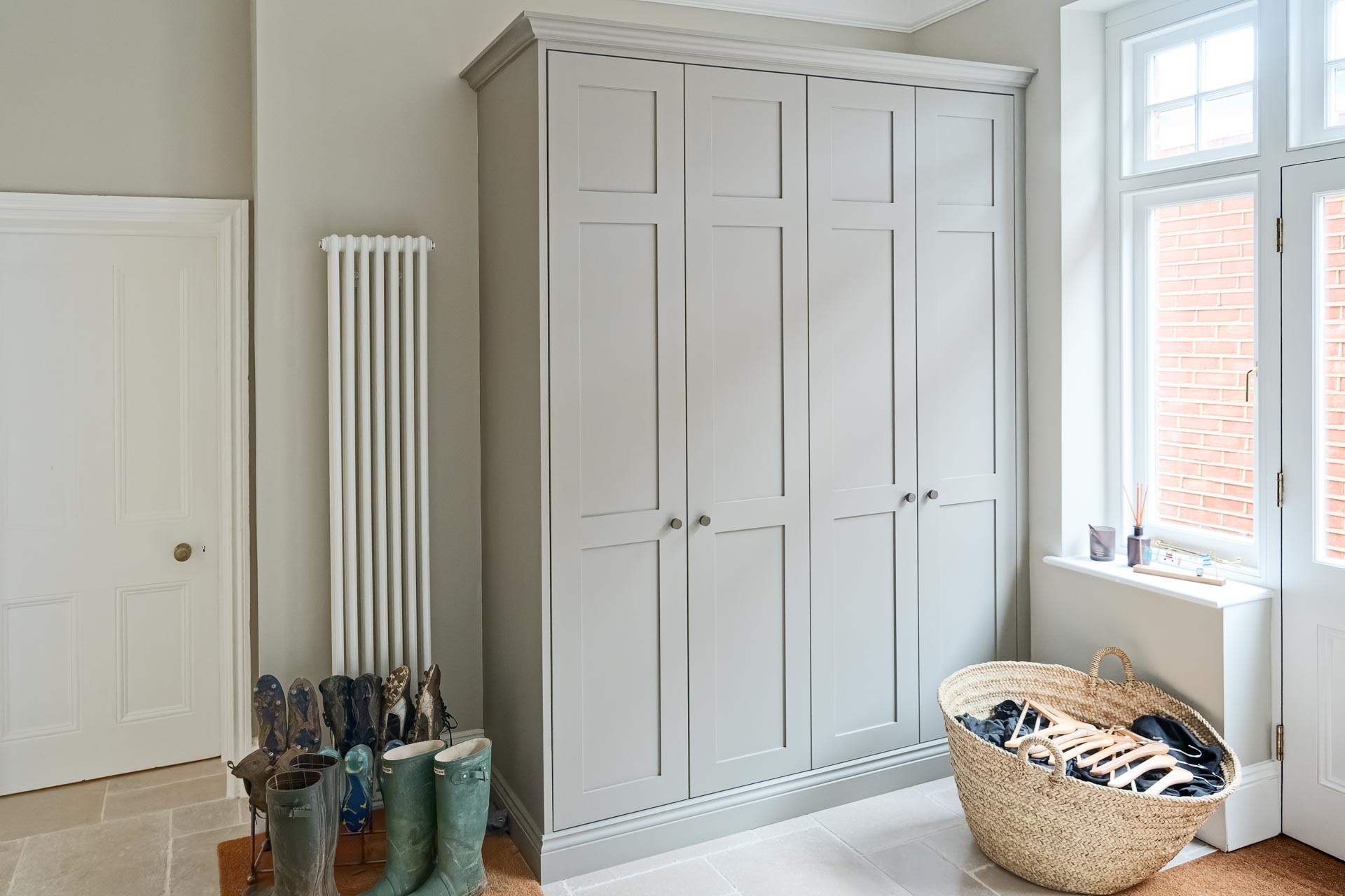 Kingham design truly bespoke kitchen shaker style luxury handmade boot mud utility linen laundry pantry larder fisher paykel miele neff  butler sink perrin rowe Guildford Surrey.