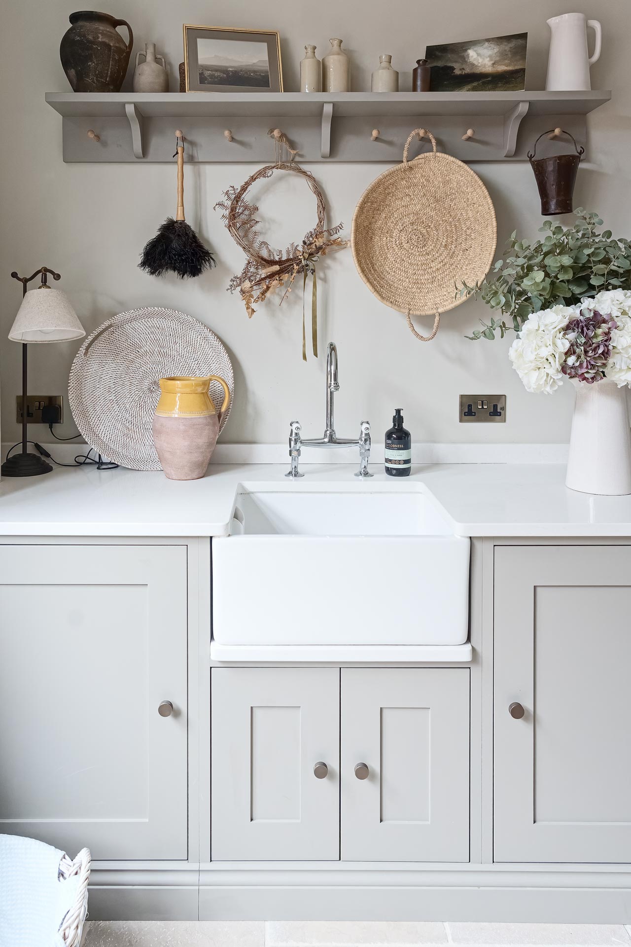 Kingham design truly bespoke kitchen shaker style luxury handmade boot mud utility linen laundry pantry larder fisher paykel miele neff butler sink perrin rowe Guildford Surrey.